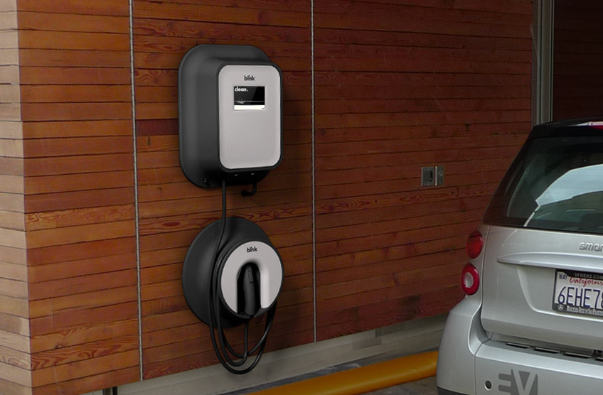 A Blink EV charger installed in a garage